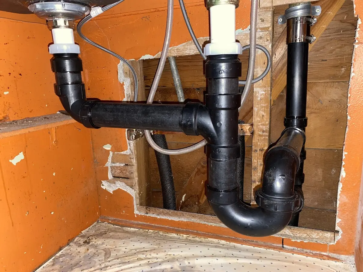 Professional Garbage Disposal Repair equipment and tools on the job in Fort Rucker